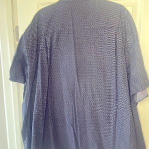 Arm length short sleeve button down shirt. Ideal office/casual business wear.